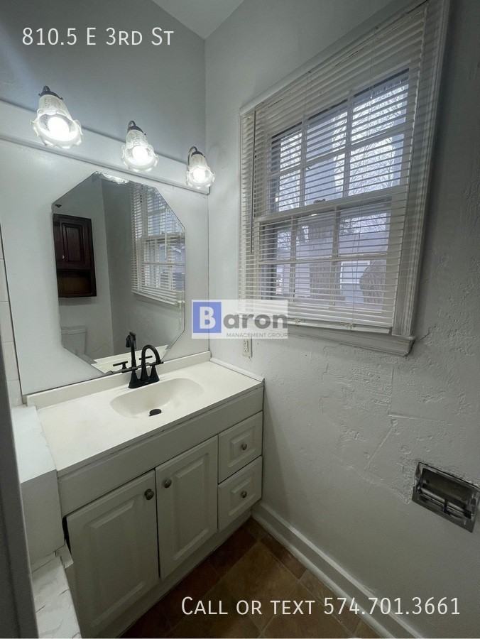 E 3rd St - Photo 2 of 11