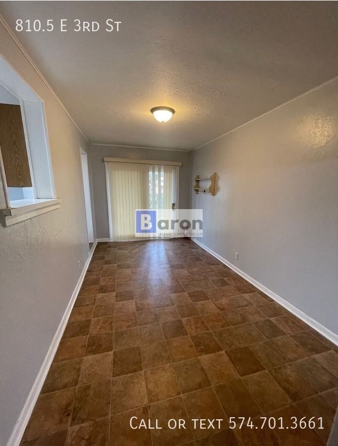 E 3rd St - Photo 5 of 11