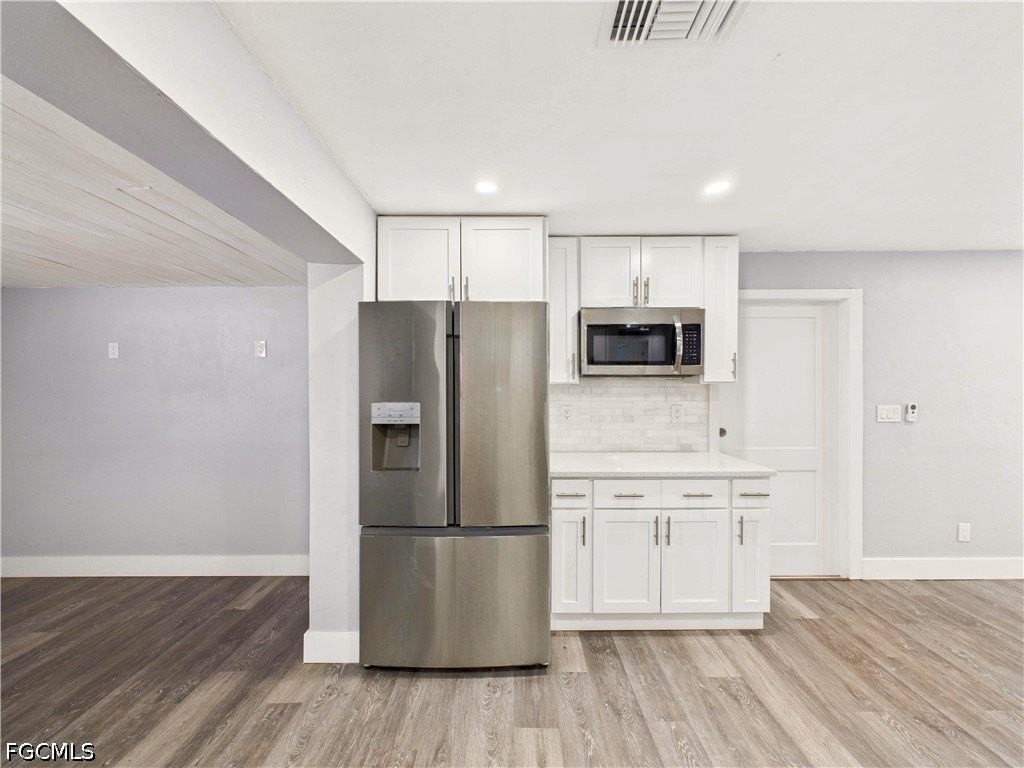 567 13th St N - Photo 4 of 23