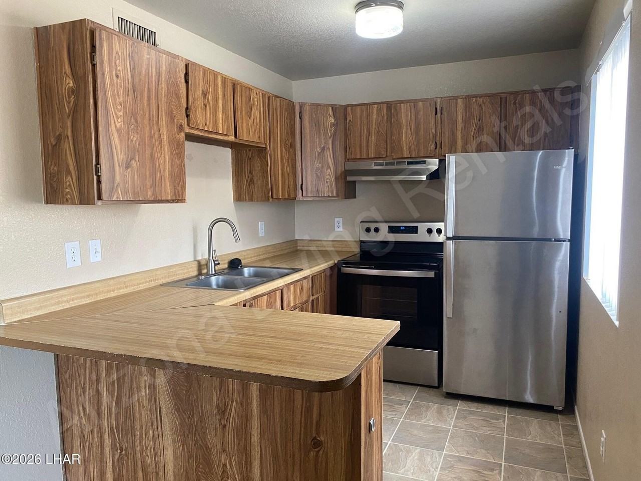 2690 Mcculloch Blvd N Apt 1 - Photo 2 of 10