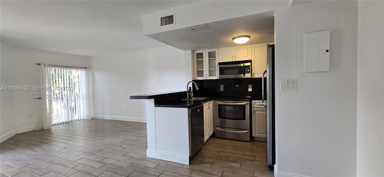 8695 Nw 6th Ln #2-212 - Photo 4 of 19