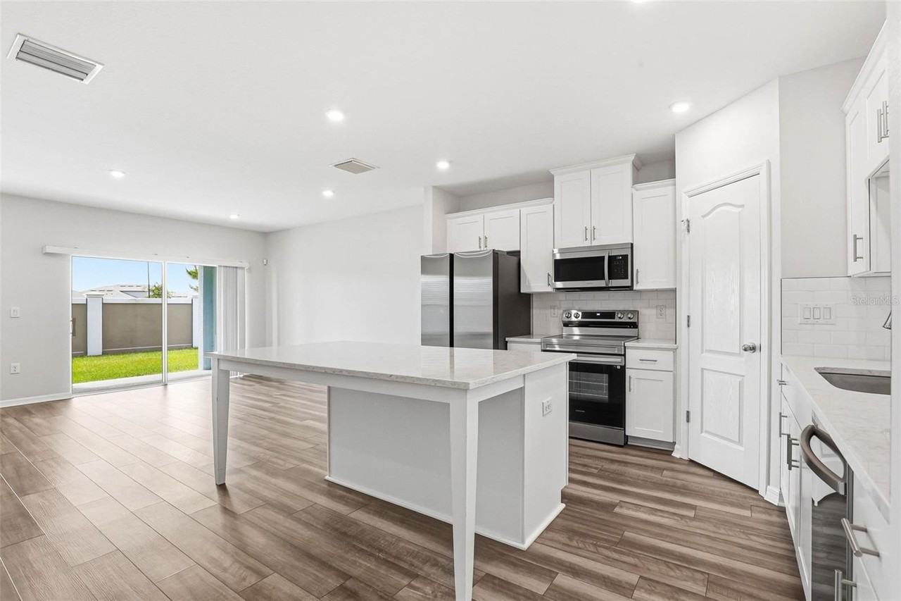 10715 Ironwood Tree Way - Photo 2 of 50