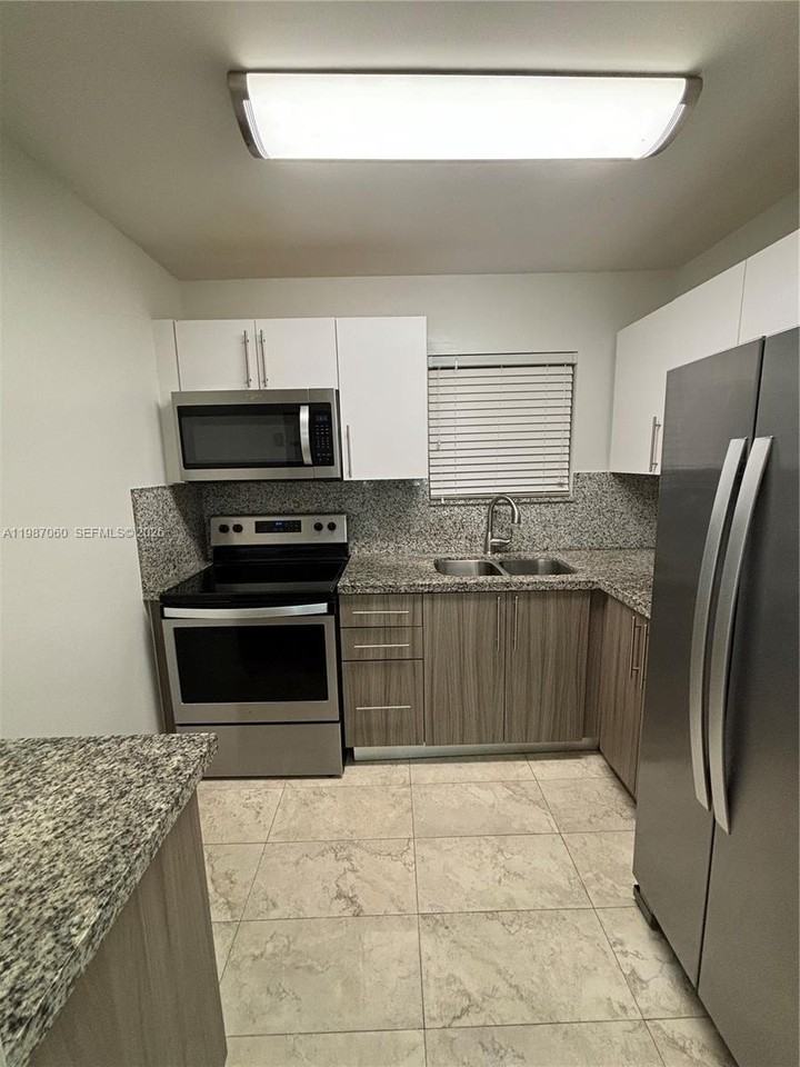 7470 Miami Lakes Dr #B208 - Photo 2 of 31