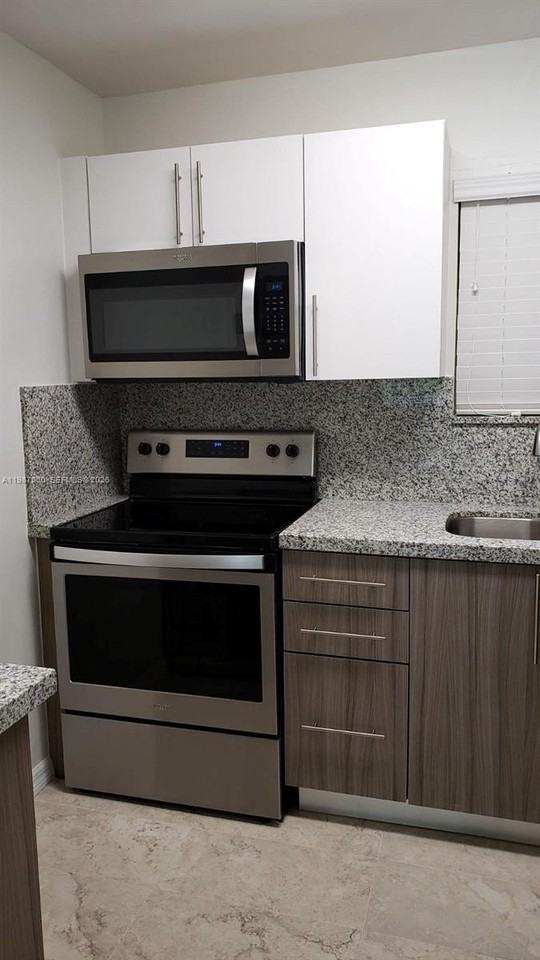 7470 Miami Lakes Dr #B208 - Photo 4 of 31