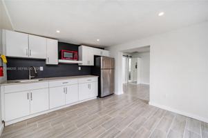 featured image of 10954 Sw 157th Ter #1