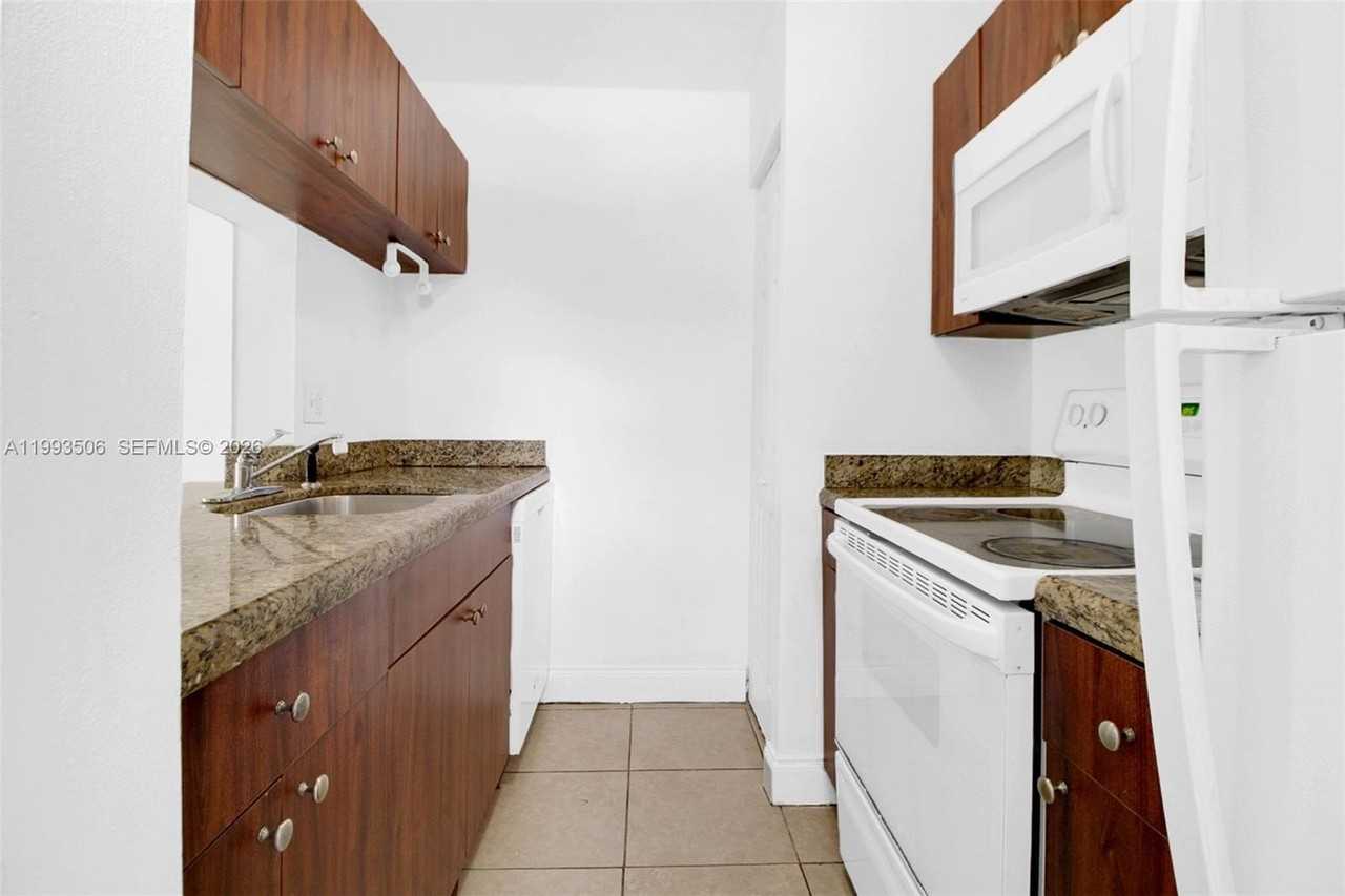 9730 Hammocks Blvd #203-28 - Photo 2 of 20