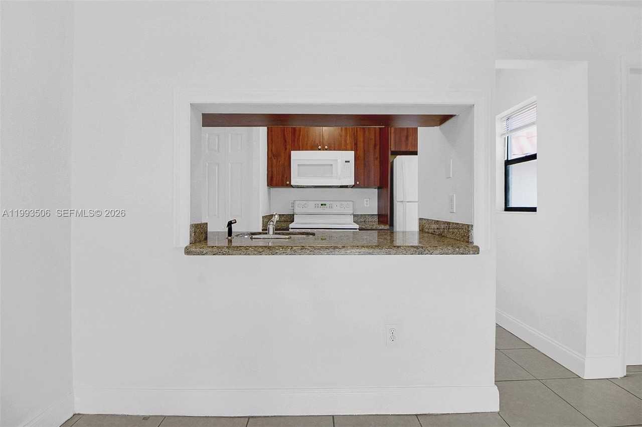 9730 Hammocks Blvd #203-28 - Photo 3 of 20