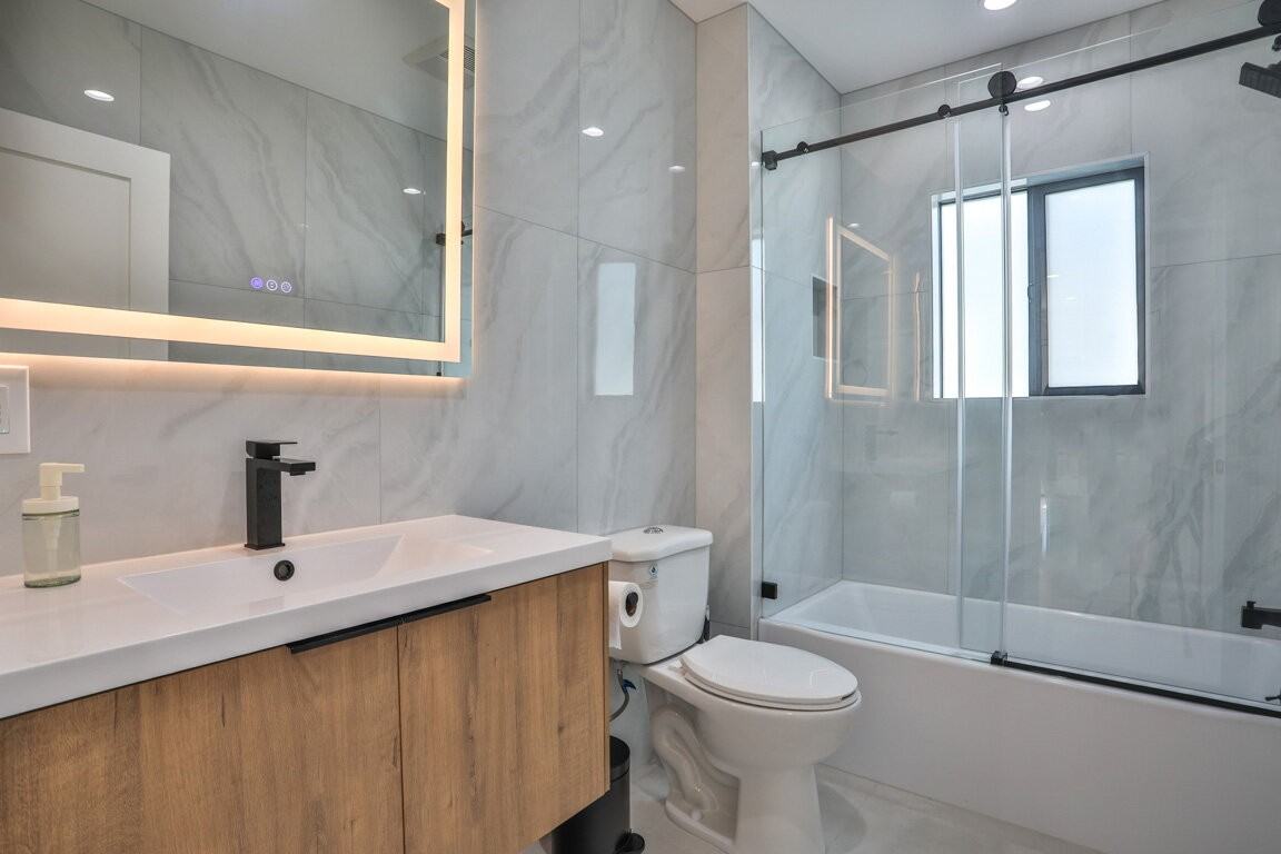 111 E 67th Way - Photo 3 of 12