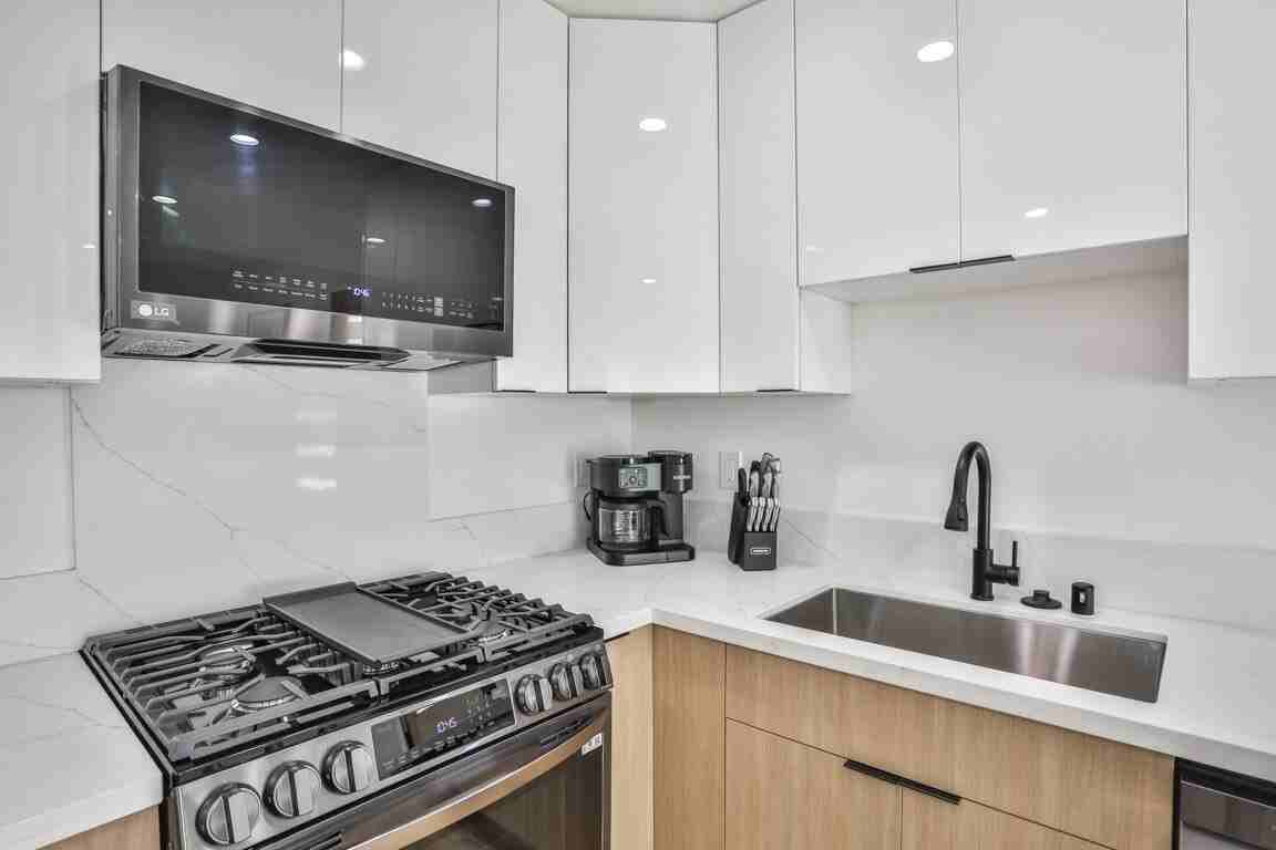 111 1/2 E 67th Way - Photo 7 of 10