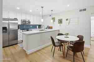 featured image of 4704 E Paradise Village Pkwy N Apt 228