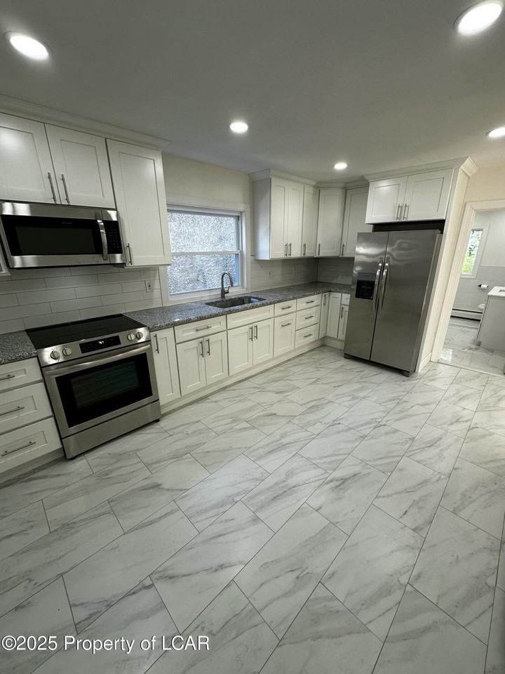 1414 Lafayette St - Photo 4 of 10