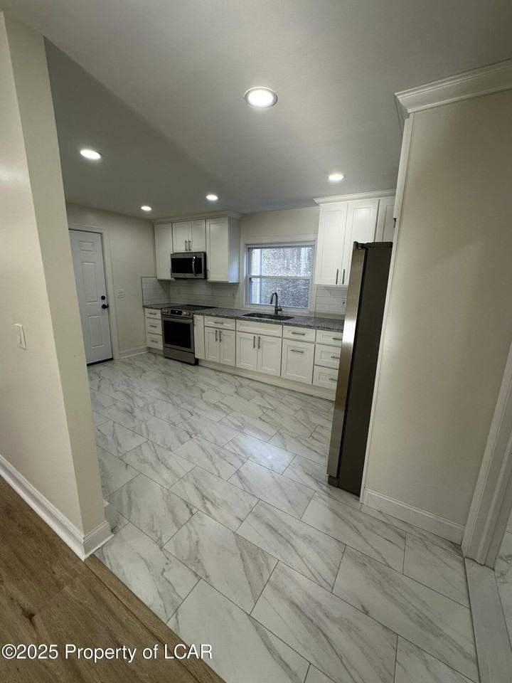 1414 Lafayette St - Photo 5 of 10