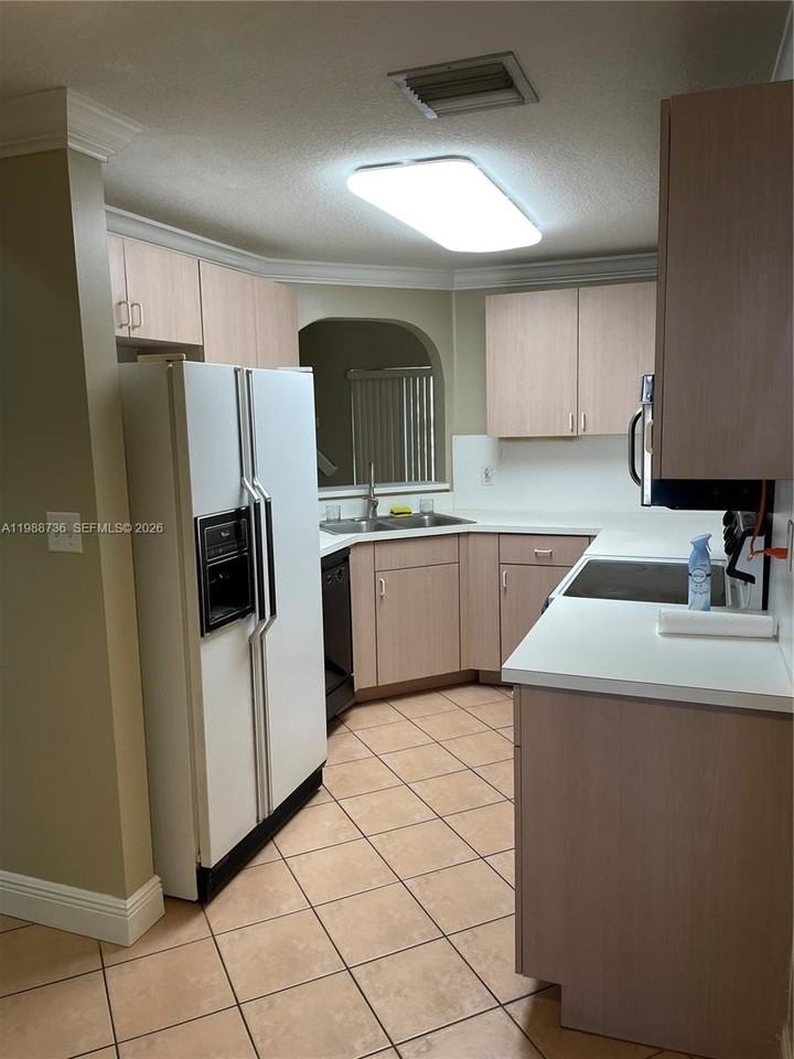 10240 Sw 154th Circle Ct #107-6 - Photo 2 of 13