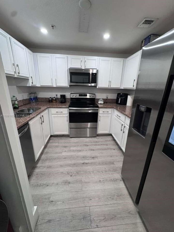 5271 Sw 8th St #305 - Photo 3 of 15