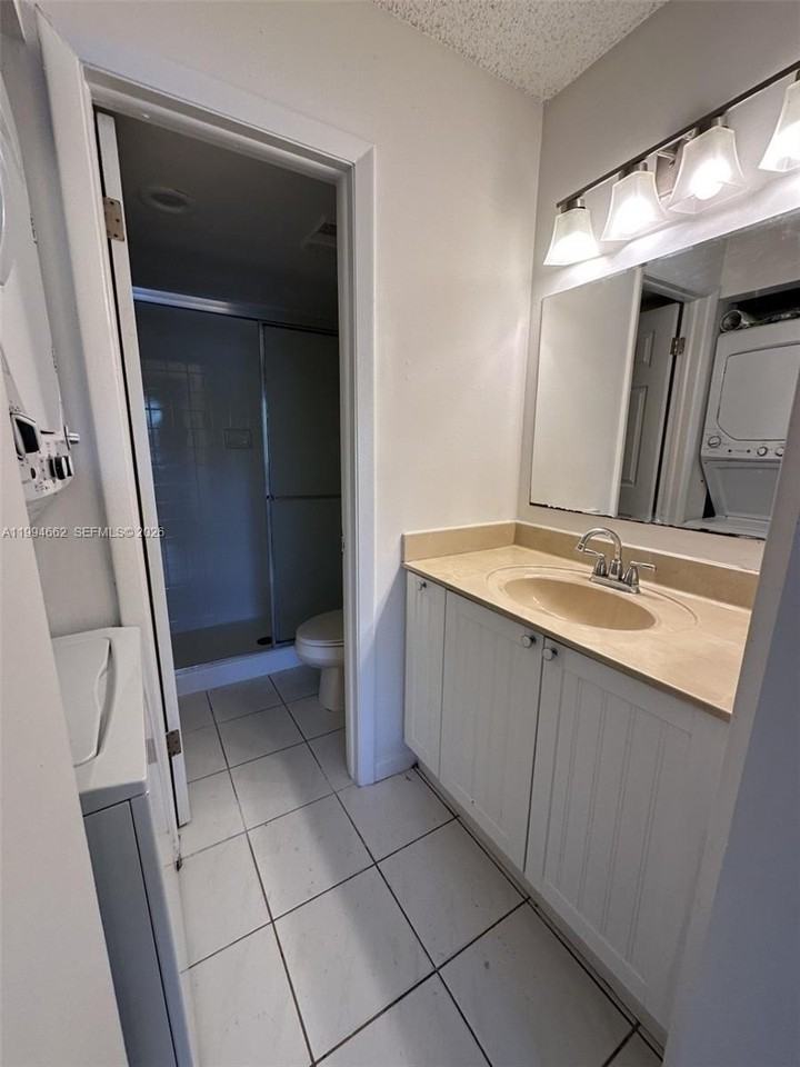 10003 Winding Lake Rd #103 - Photo 7 of 12