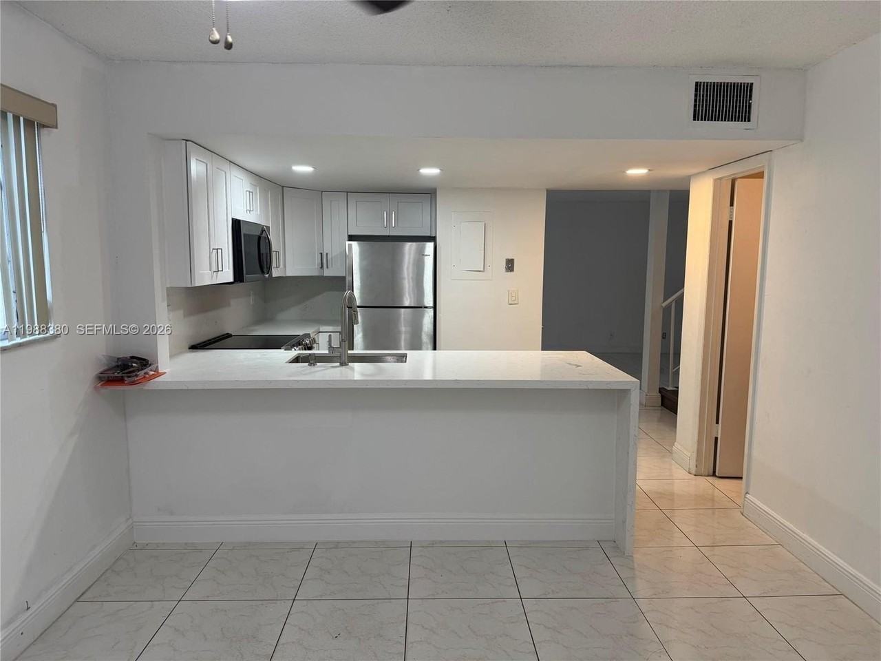 8031 Lagos De Campo Blvd #L3 - Photo 5 of 15