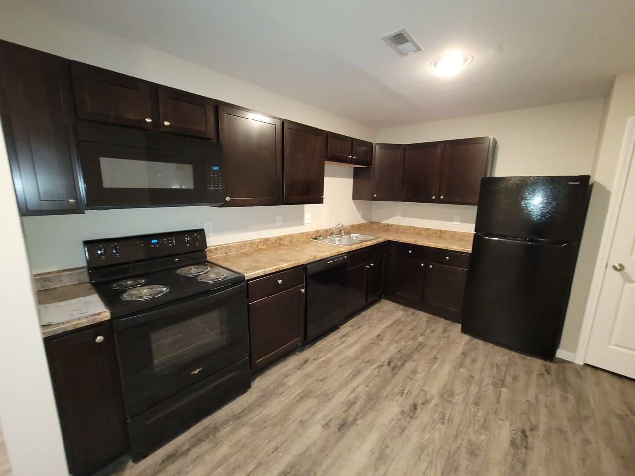 Village West Apartments - Photo 6 of 36