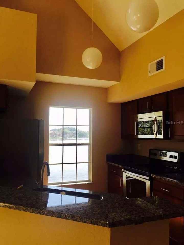 9020 Lake Chase Island Way #9020 - Photo 6 of 15