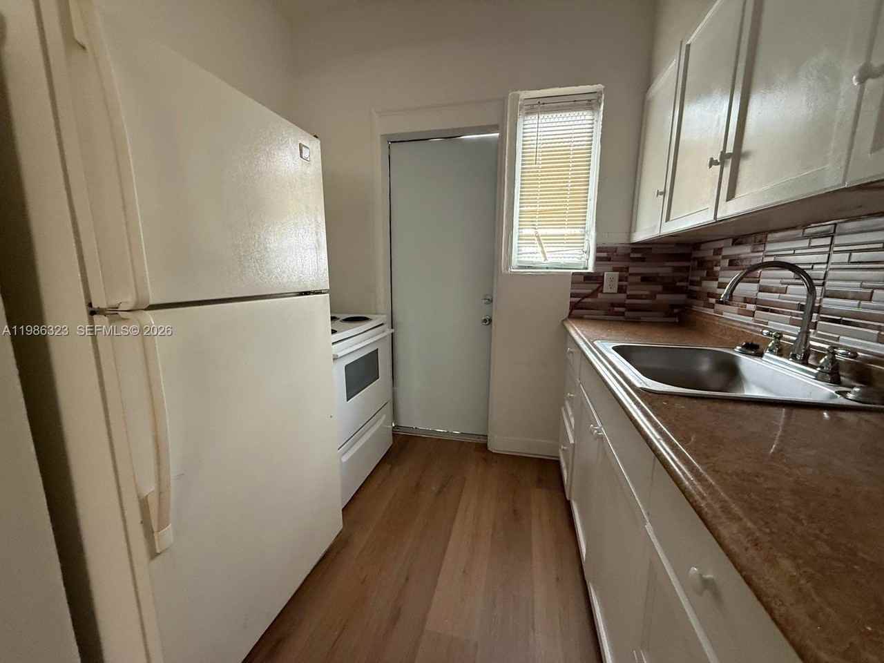 6830 Harding Ave #1 - Photo 4 of 13