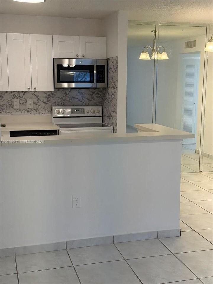 823 Ne 199th St #104-12 - Photo 7 of 27