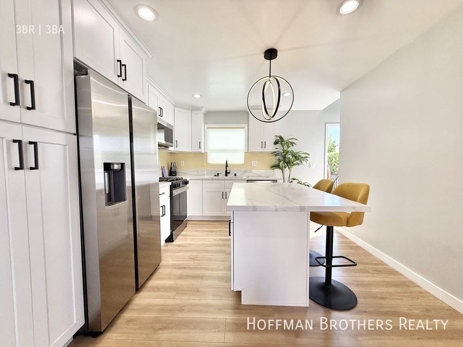 3031 1/2 Wellington Rd - Photo 3 of 13