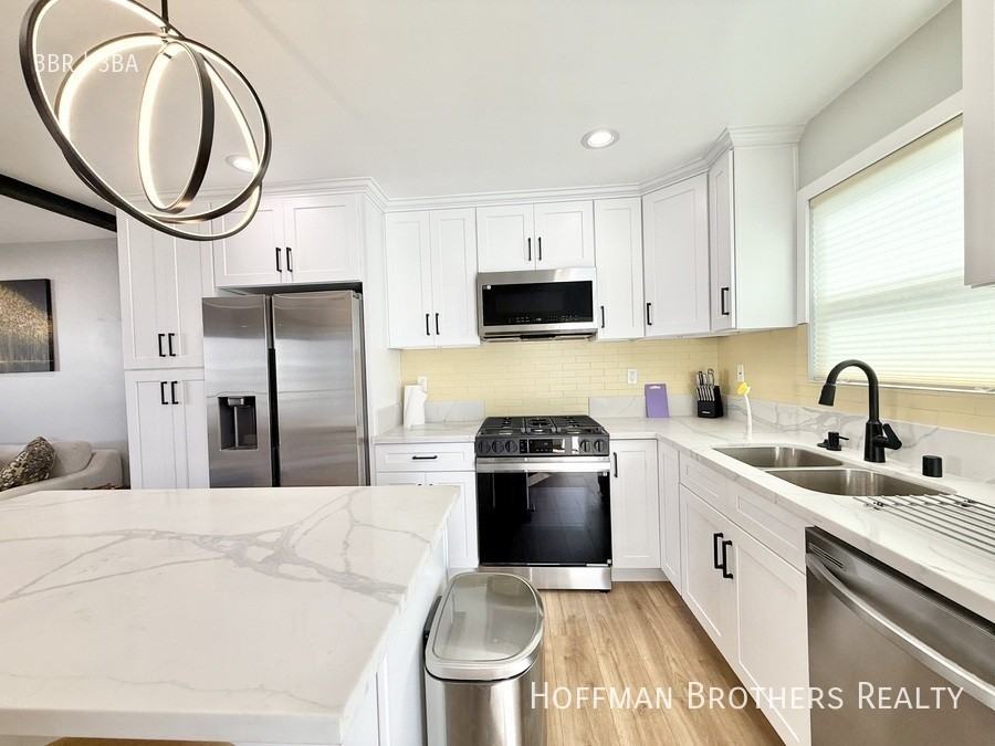 3031 1/2 Wellington Rd - Photo 4 of 13