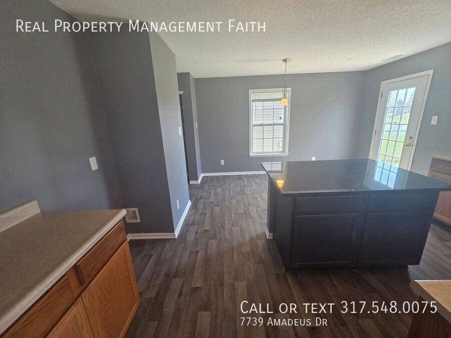 7739 Amadeus Dr - Photo 4 of 26