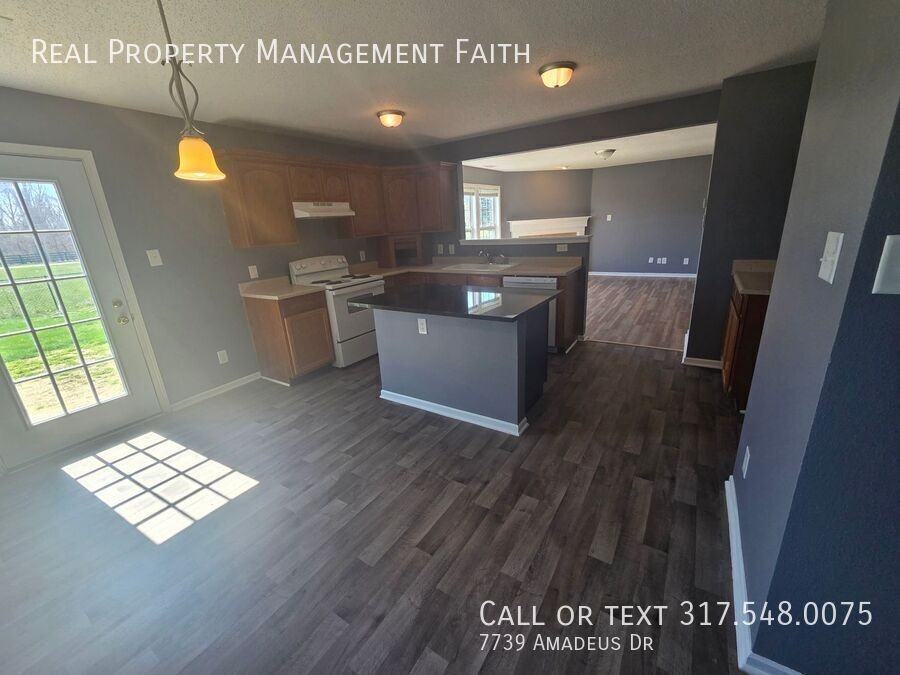 7739 Amadeus Dr - Photo 6 of 26