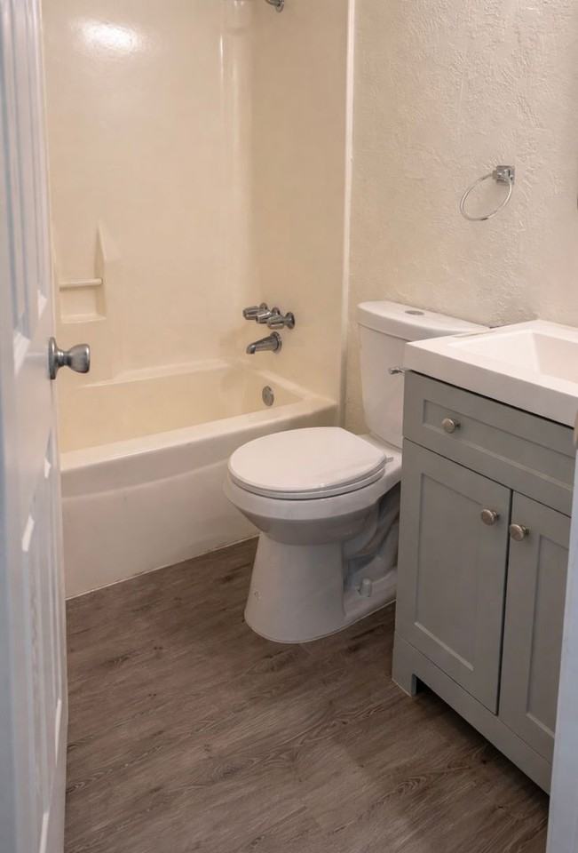 PARK PLACE APARTMENTS - Photo 3 of 12