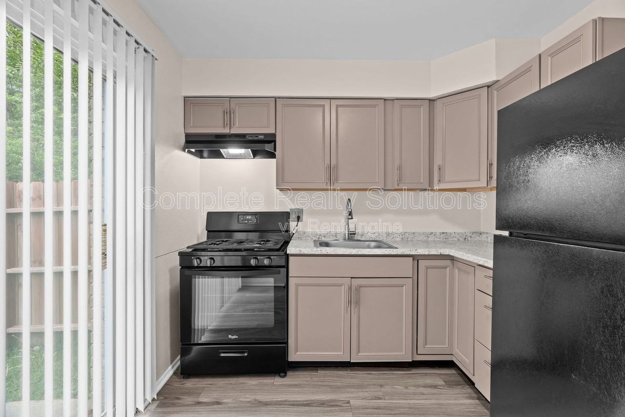 2323 Woodson Rd #J - Photo 4 of 16