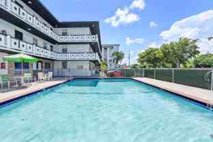 **Coastal Living Made Easy – Free Parking, Water Included, Minutes from Hollywood Beach!** - Photo 1 of 1