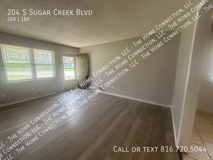 204 S Sugar Creek Blvd - Photo 3 of 13