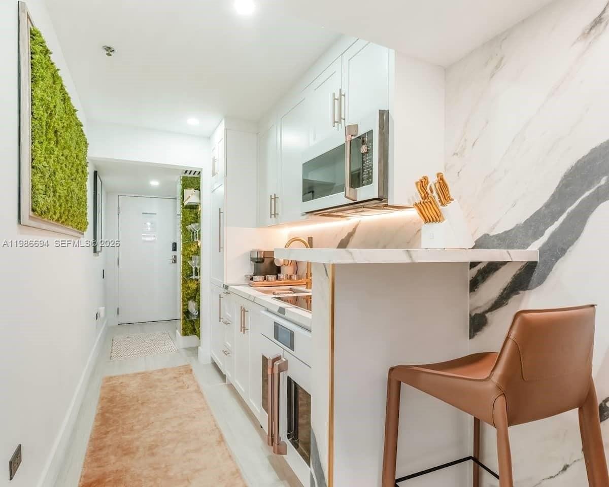 100 Collins Ave #202 - Photo 4 of 19