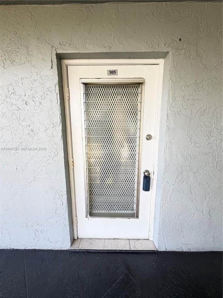 9201 Lime Bay Blvd #305 - Photo 2 of 26