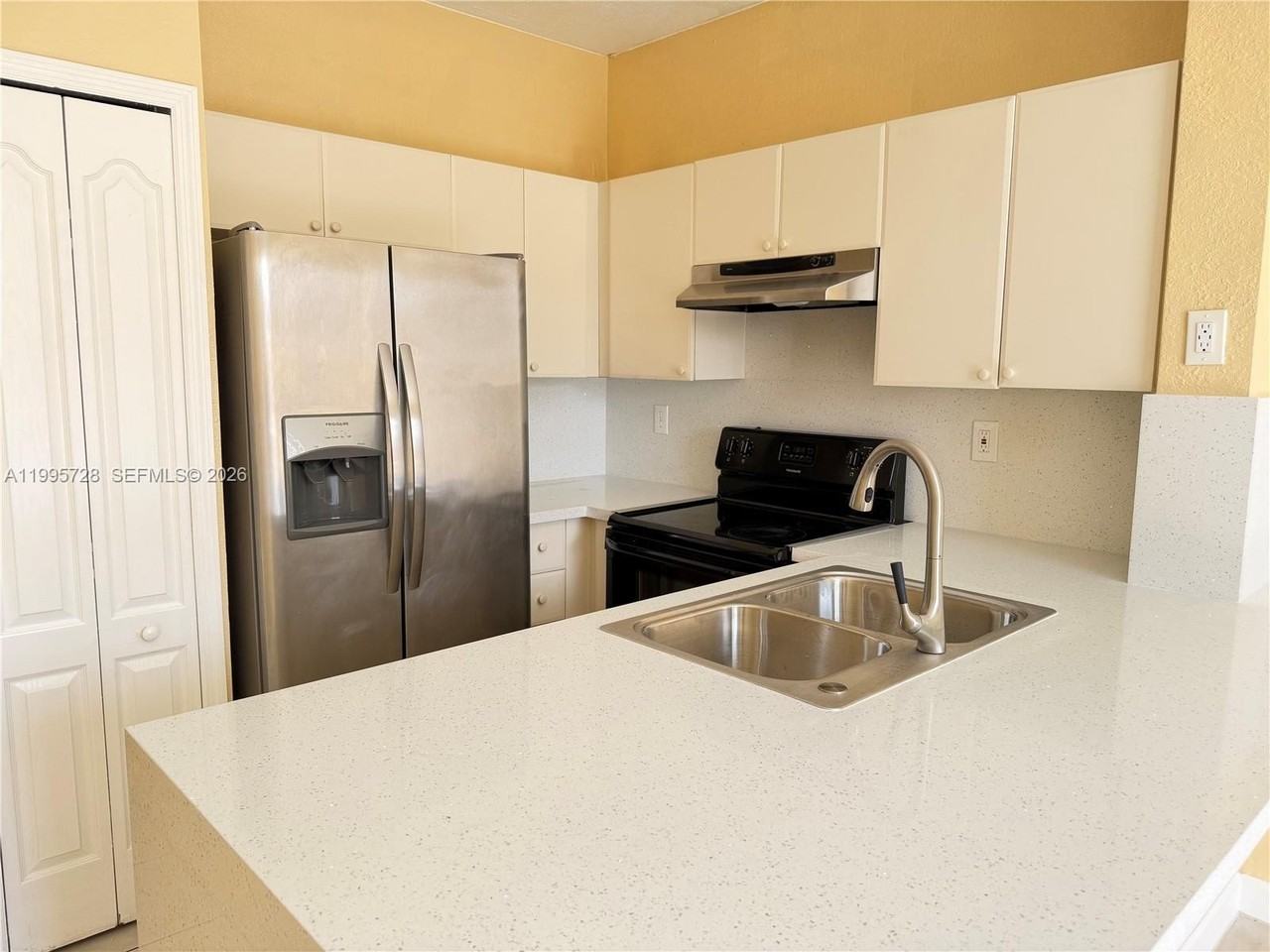 7080 Nw 177th St #209-13 - Photo 3 of 15