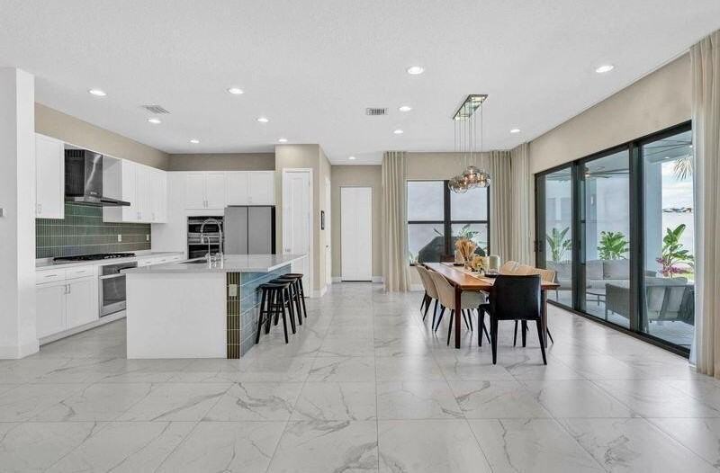 8239 Oceanus Dr - Photo 7 of 26