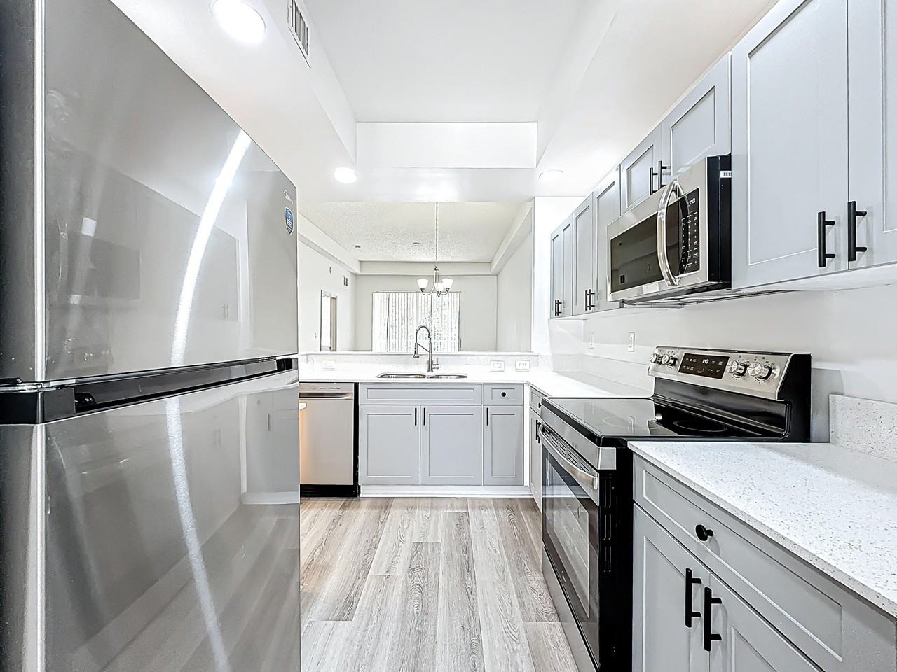 3180 N Haverhill Rd Unit 102 - Photo 2 of 9