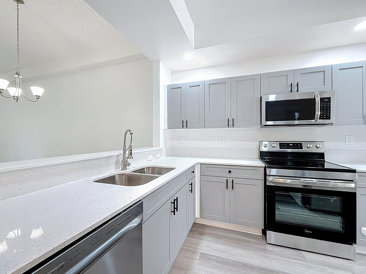 3180 N Haverhill Rd Unit 102 - Photo 3 of 9