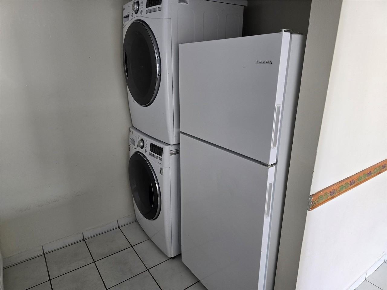 10050 Winding Lake Rd #103 - Photo 4 of 12