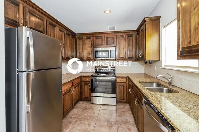 6003 E 133rd St - Photo 6 of 13