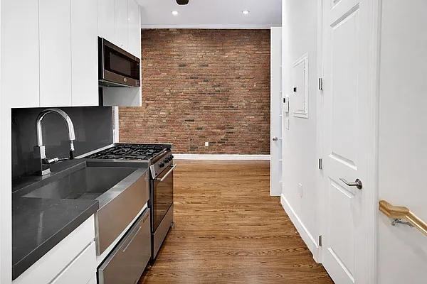 E 1st St #1F - Photo 2 of 8