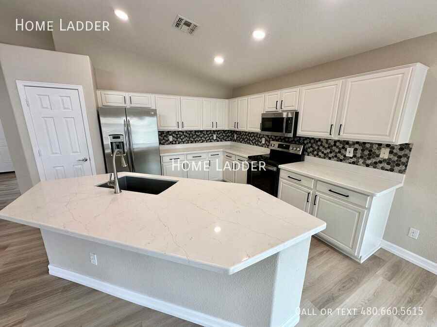 9732 E Kiowa Ave - Photo 4 of 21