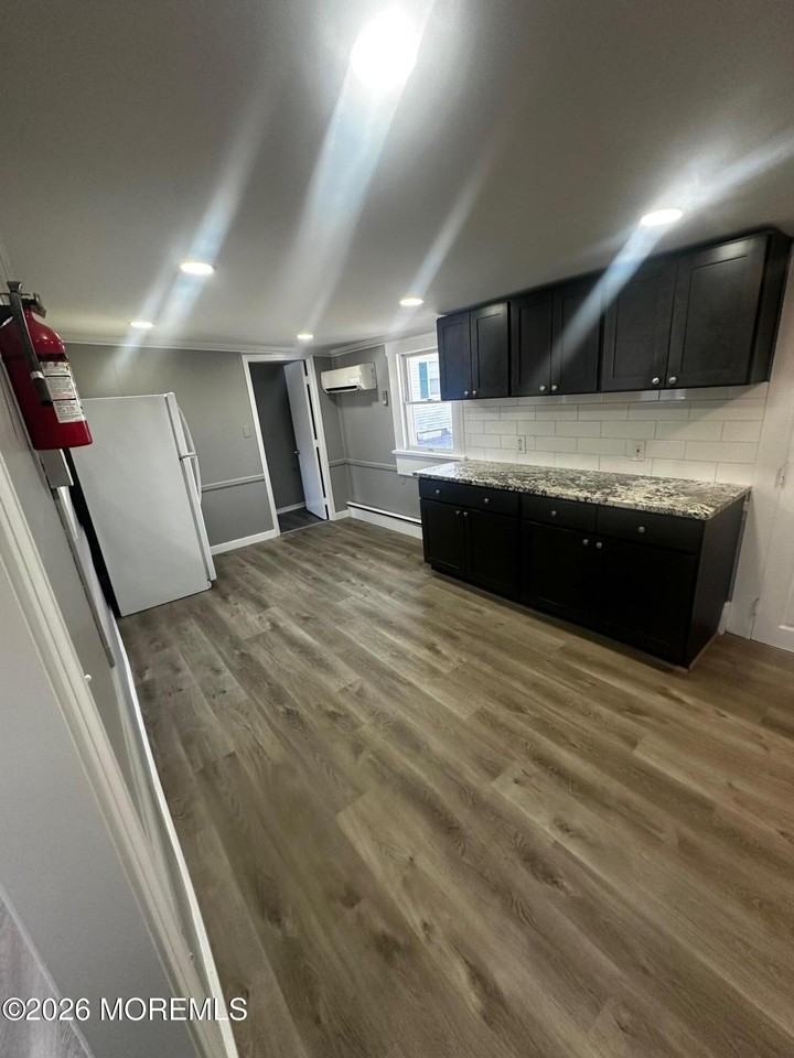 114 W 4th St - Photo 2 of 15