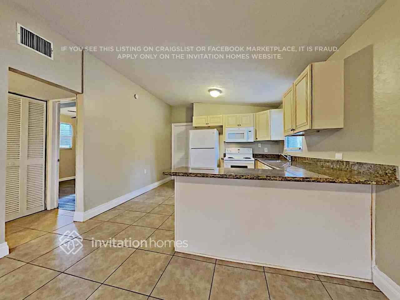 8907 67th Way N - Photo 5 of 17