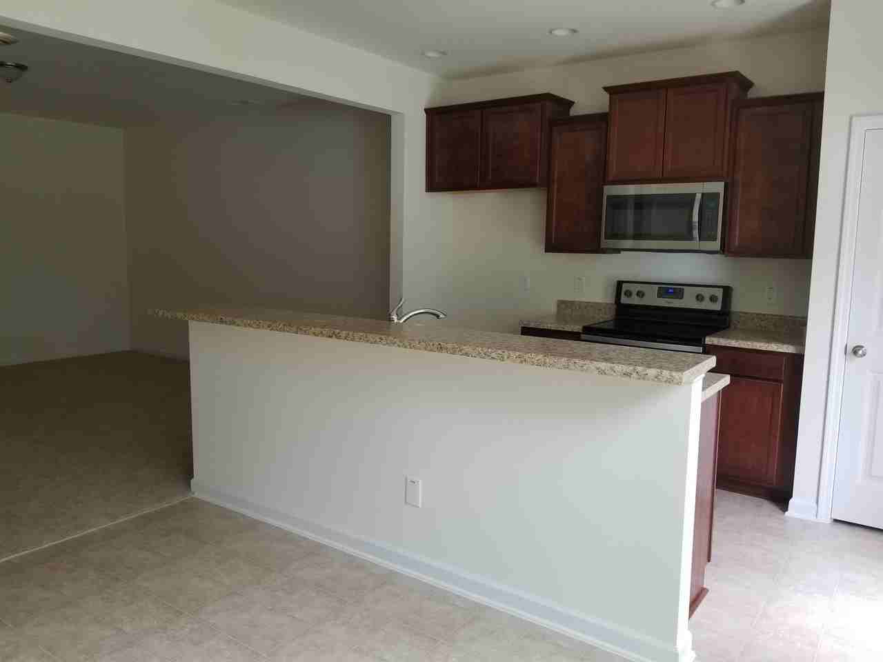 49 E Grove Point Dr #1 - Photo 4 of 15