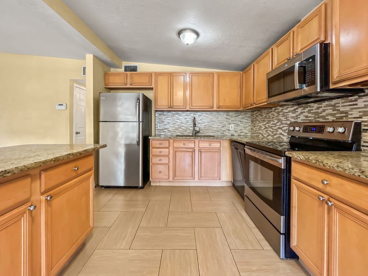 9129 82nd Way - Photo 5 of 15