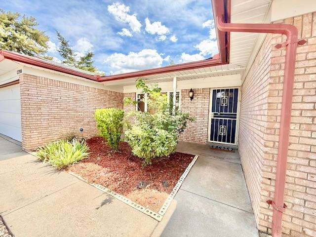 12208 Victoria Falls Dr Ne #1 - Photo 2 of 25