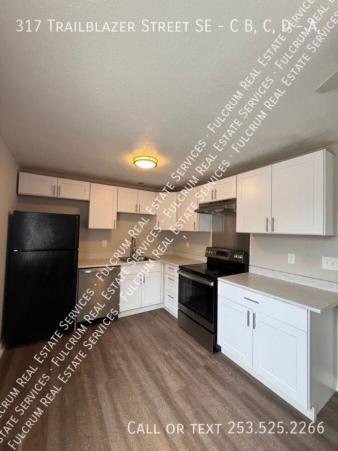 317 Trailblazer Street SE - C B, C, D #A - Photo 3 of 6