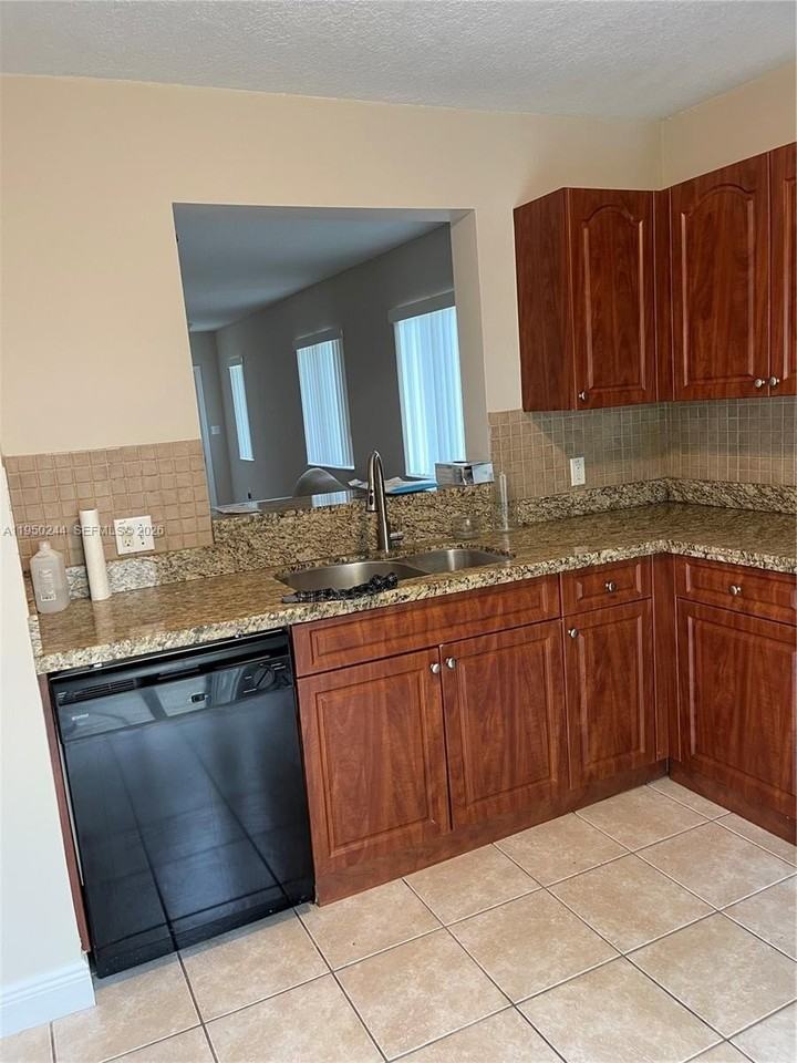 4785 Sw 62nd Ave #101 - Photo 3 of 13