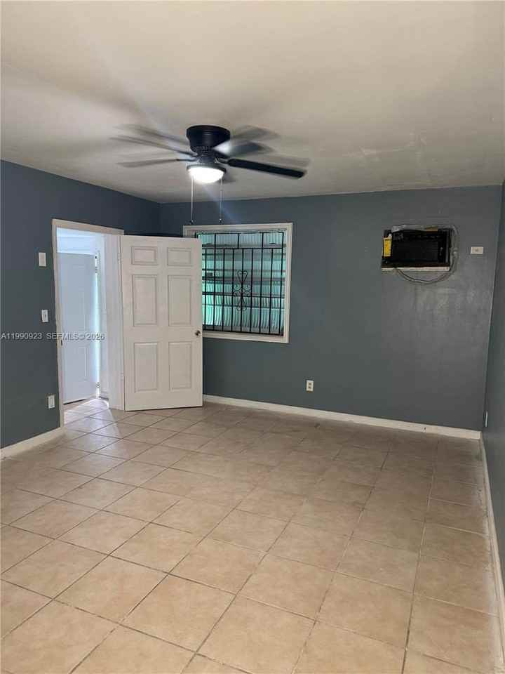 1230 Nw 180th Ter #1 - Photo 2 of 6